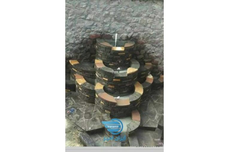 اجرای نصب آبنما و  آبشار با سنگ مالونی لاشه ای ورقه ای اجرا با بهترین طراح توسط پیمانکاری رحمانی و رشیدی
