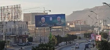صور عملاقه للشهیدین الفریق قاسم سلیمانی والقائد أبو مهدی المهندس وسط صنعاء